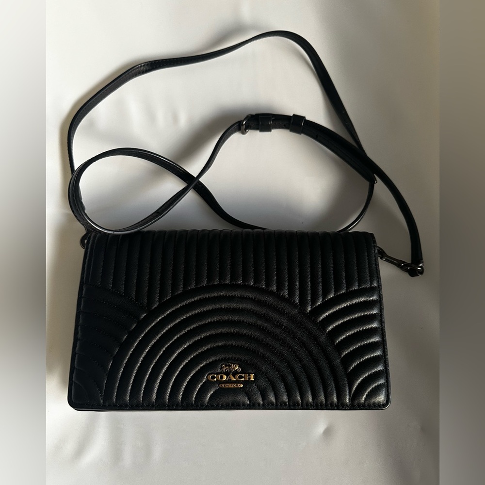 Coach crossbody bag with leather strap and chain style strap